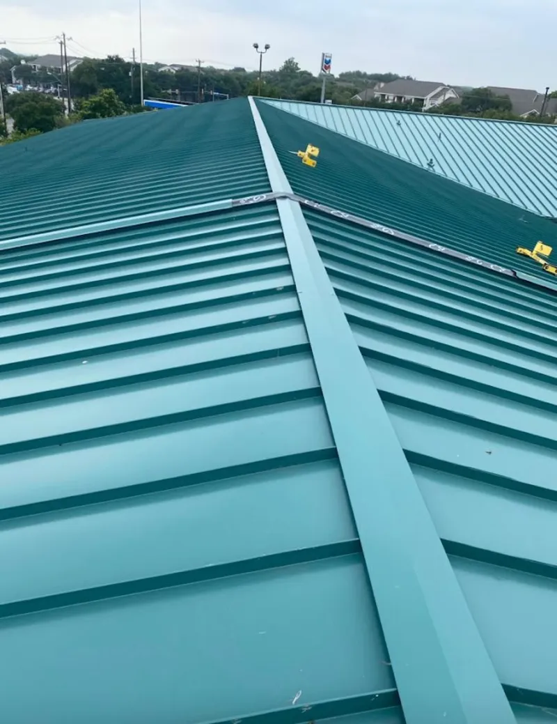 Green commercial metal roof ridge and valley for Metal Roof Repair in Fox Lake